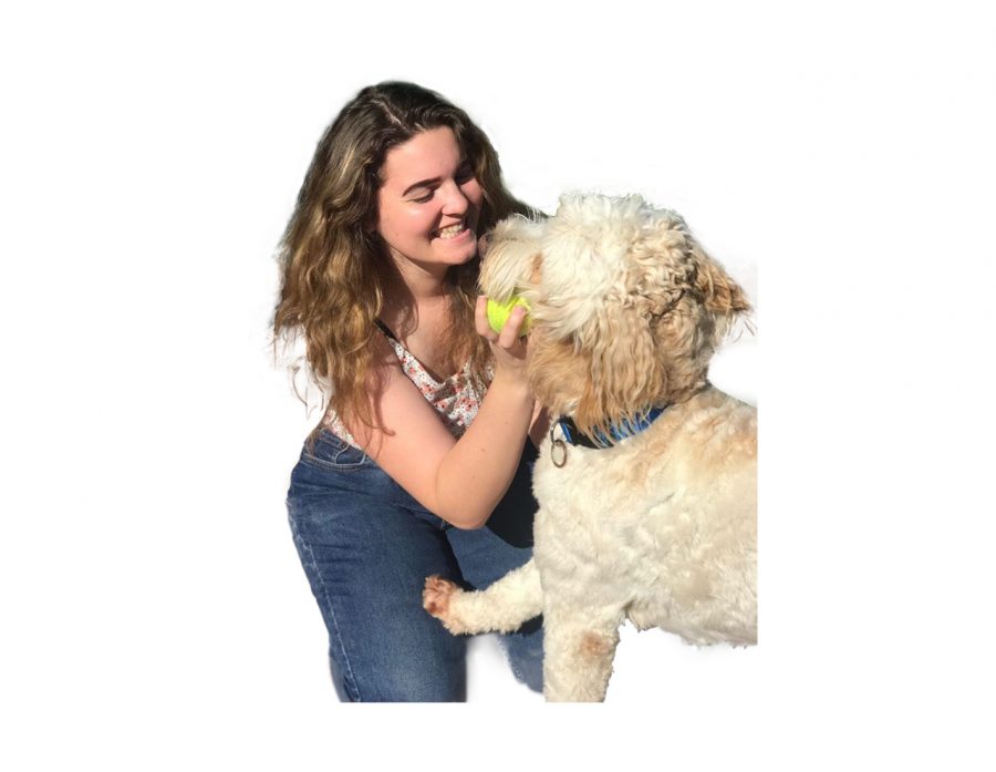 Junior Victoria Webb bonds with her emotional support dog Phoenix.