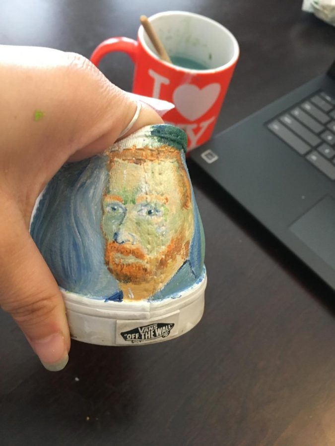 Sneaker art on a heel done by Junior Lhani Cobarrubias. Cobarrubias uses primarily cool toned colors on this shoe and uses a laptop to reference her inspiration of artwork done by Vincent Van Gogh, titled “ Self-Portrait.”