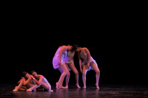 Dancers from the San Diego Dance Academy perform a contemporary dance at Eastlake High’s Ruth Chapman Hill Theater on Feb. 28.  The performers are barefoot and portray a story using facial expressions. 