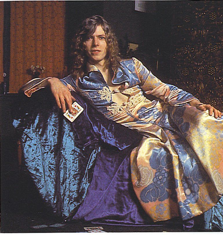 English singer-songwriter David Robert-Jones, better known as David Bowie, pictured in a floral dress designed by Michael Fish for the British cover of his album The Man Who Sold The World. The cover was controversial, so an alternative one needed to be made for the U.S. release. 