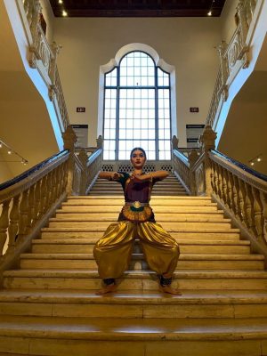 Senior Anoushka Savgur performs the traditional Indian dance known as Bharatanatyam at the Natesha School of Bharatanatyam. This performance is one of Savgurs first performances in eight months due to the COVID-19 pandemic.