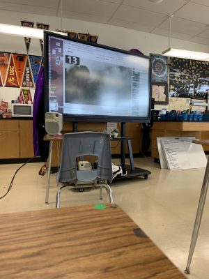 Bonita Vista High International Baccalaureate Biology Higher Level, Advanced Placement Biology and Accelerated Biology teacher Michelle Mardahl-Dumesnil smart board plays a video to her in-person students. During her third period class the Google Meets call is played on the screen.