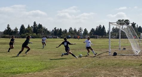 BVH varsity girls soccer forward and junior Vanessa Ramirez (18) shoots the ball and gives the Barons one more goal. Ramirez scored the first two goals of the game, giving them a 2-0 lead.