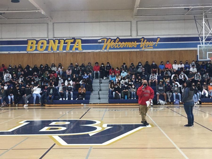 Assistant Principal Christopher Alvarez announces the confirmation of homecoming and gradnight to the class of 2022 during the morning assembly on Oct. 13. Following the announcement, IB Math A&A teacher Christina Ada provided further information with rules and expectations the student body would be expected to follow.
