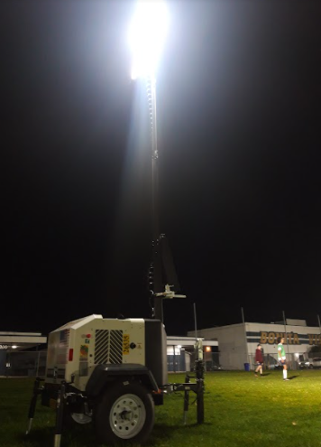 Various sports and extracurriculars utilize
the soccer field after school due to the
construction taking place at the football
field. The portable lights active once the
sun goes down.