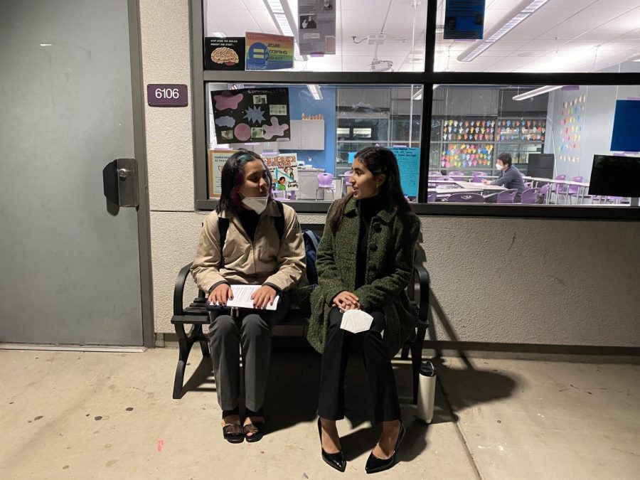 Treasurer and junior Eiffel Sunga sits with her Public Forum debate partner Vice President of Speech and junior Giselle Geering after their first round. As they wait for their second round to begin, they reflect on how they performed in their first round.
