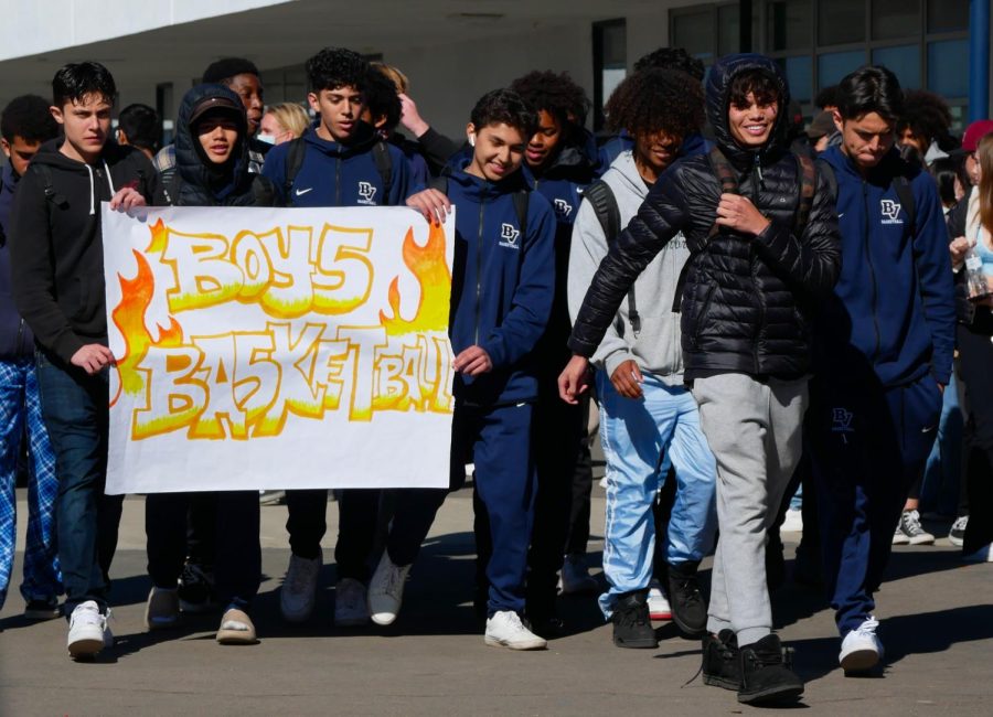 On Feb. 4 during the pep rally, the BVH boys’ basketball team begins walking to the stage in the quad. Holding their sign as it reads, ‘Boys Basketball’ with flames coming off the letters. As the players walked, they followed the beat of the music in the background. 