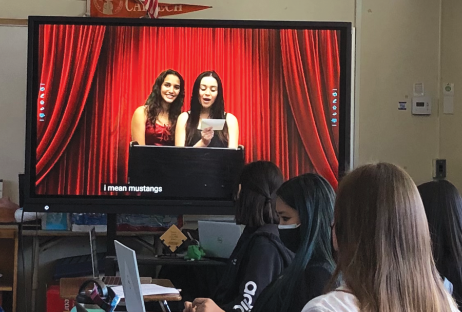 On Feb. 4, Bianca Ramirez and Kayla T. present an award to the Bonita Vista Barons during the virtual assembly. Students watch attentively from their desks in room 703.
