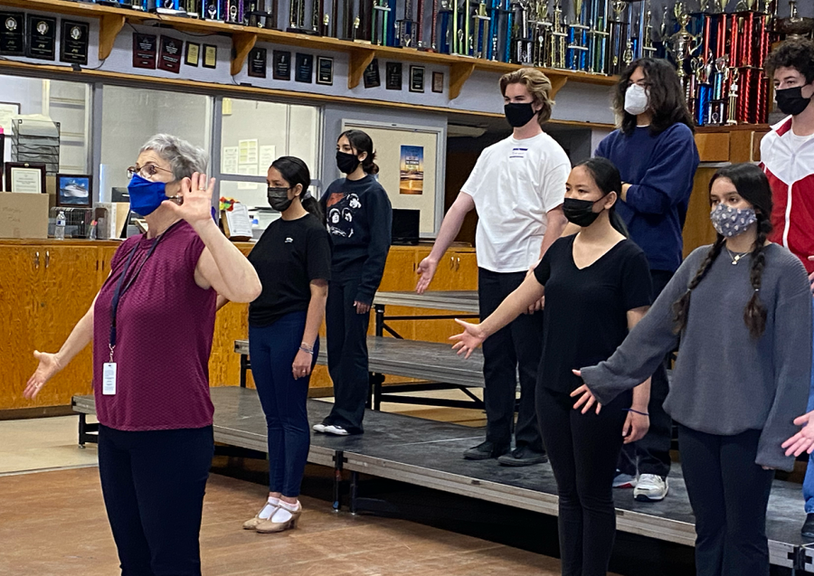 Vocal Music Department (VMD) Consultant Reina Bolles leads Music Machine in learning new choreography for their competition set. Bolles stepped up to help direct the VMD as a volunteer.