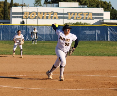 An intense game between Bonita Vista High (BVH) and Mission Hills high school (MHHS), senior and pitcher Giulianna Clavel begins her pitch. Clavel is the only senior on BVHs 2022 varsity softball team.