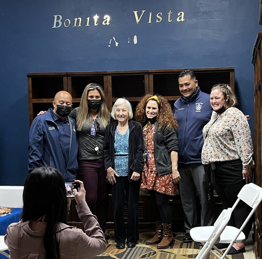R. Schindler takes a photo with BVH staff that attended her event. Before the event started, she waited in a locker room until all student attendees were situated in their seats.