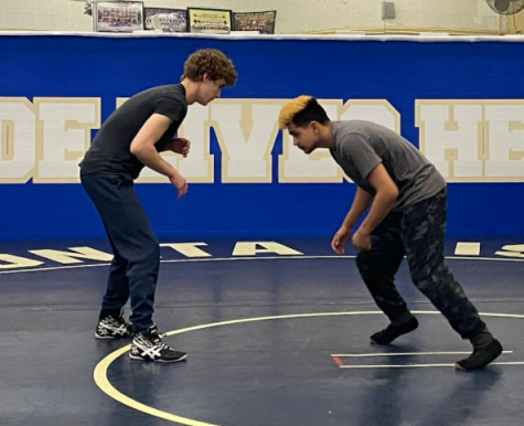 On March 14, 2022, senior and star
wrestler Isaac Lopez practices a with
his partner in the Wrestling room.
By the end of the 2021-2022 winter
season Isaac Lopez ranked tenth place
in California as a wrestler.