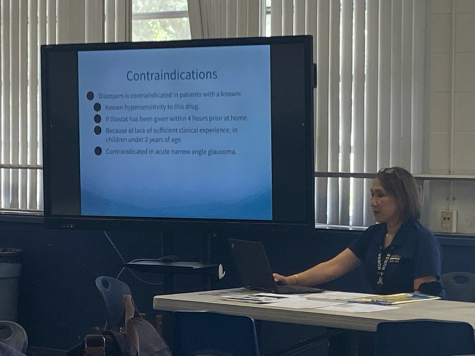 Bonita Vista High (BVH) nurse Bernadette Currin teaches BVH staff members
through her presentation about Diastat. The presentation informs staff
members about what Diastat is used for and how it should be administered.