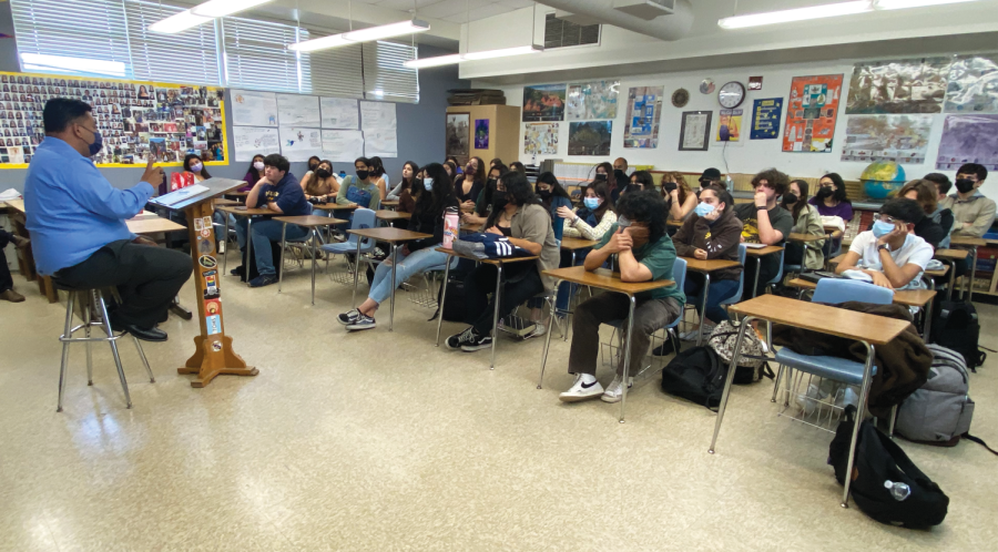 BVH principal Roman Del Rosario visits Jose Vallejo’s fifth period History of the America’s (HOTA) to get student opinions on the white gown debate. Fifth period HOTA was especially adamant about keeping the white gowns reserved 
 for IB diploma candidates.