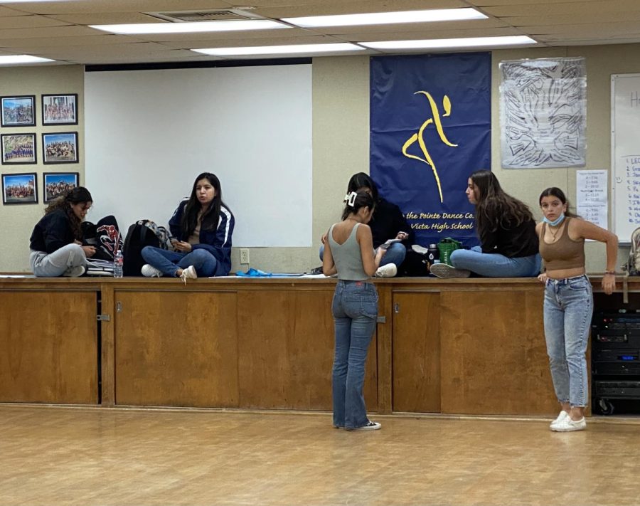 On April 27, IB Dance students are seen in second period IB dance not wearing their masks as it is not required anymore. However, they are working on assignments for their IB Dance class on their Mental Health Day.