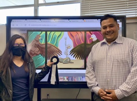 Senior and winner of the Principles Choice Award, Ariadne Flores (left) displays her project, “The Whiteness in Me” while standing with Roman Del Rosario,
Ed.D. (right). Her project highlights her exploration of Mexican-American identity.