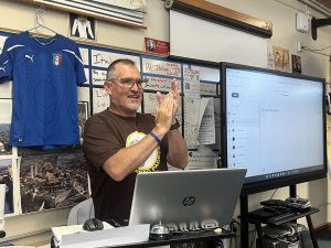 Bonita Vista High Italian teacher Robert Pirazzini has a bright look on his face, as his period 5 class practices speaking in Italian through presentations. Pirazzini appreciates his students who are trying their best.