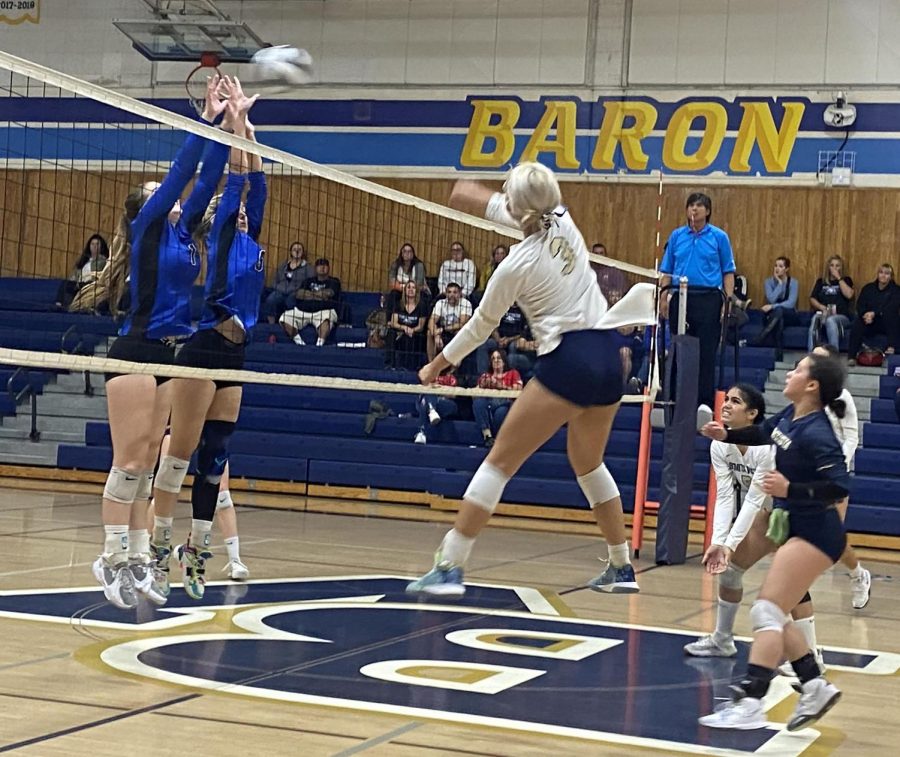 Oct. 26 in the Bonita Vista High (BVH) gymnasium against Ramona High School (RHS)s girls varsity volleyball. Varsity volleyball player and senior Jaden Mojica spikes the ball at their first California Interscholastic Federation (CIF) game. 