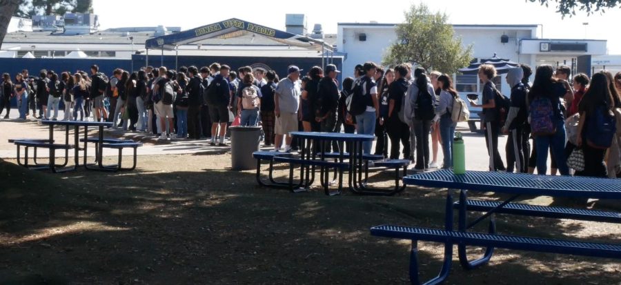 Students line up outside of the gym, waiting to enter the Homecoming assembly, held on October 28.