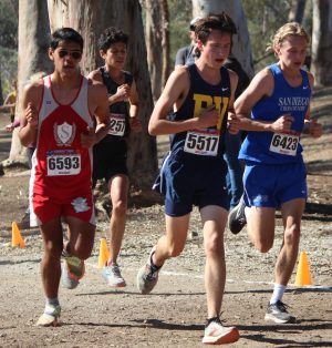 On Saturday, Nov. 12 BVH raced against several different schools at Morley Field during the cross country CIF finals. Sophomore Aaron Tighe runs during the beginning of the race, trailed by varying schools.