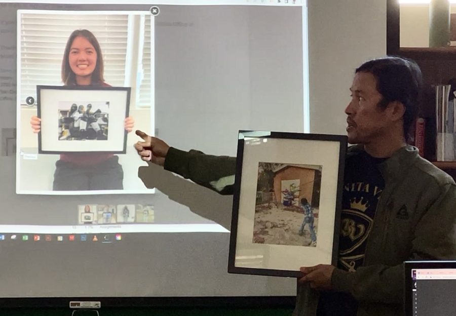 BVH Photography teacher Edwin Lim shares with the class congressional art contestant Giovanna Sanchezs photo with his class. Edwin Lim Provides students with art award opportunities. 
