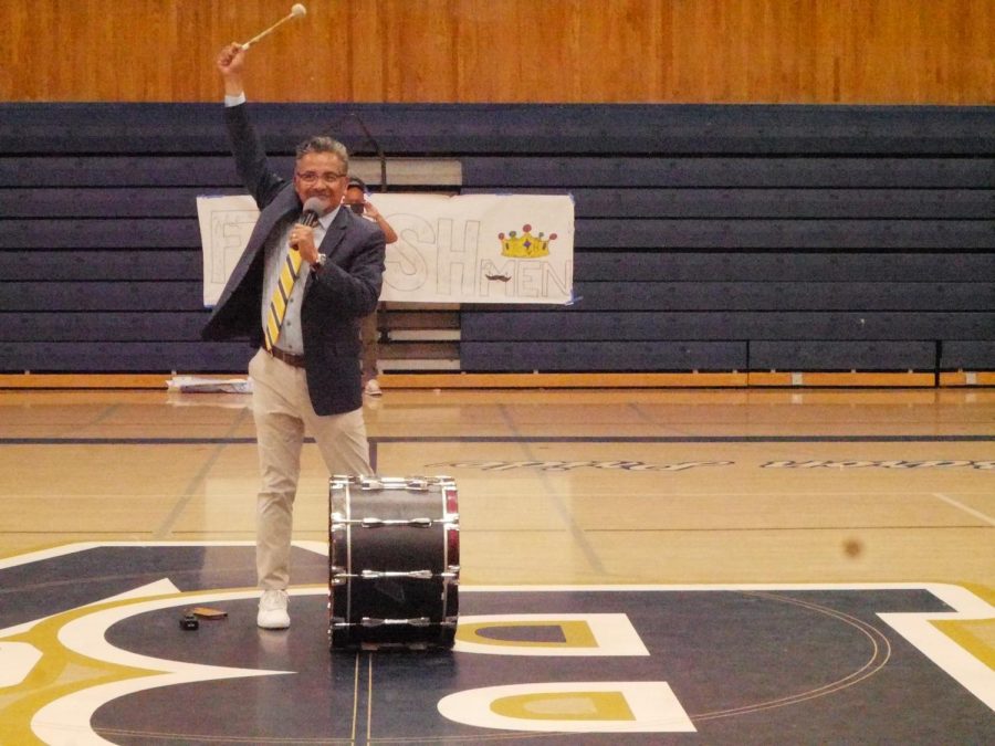 On Jan. 12 in the Bonita Vista High (BVH) gymnasium, BVH principal Lee Romero gets ready to hit a drum for a chant during a grade level presentation. Romero introduces himself using his new chant to the freshman.