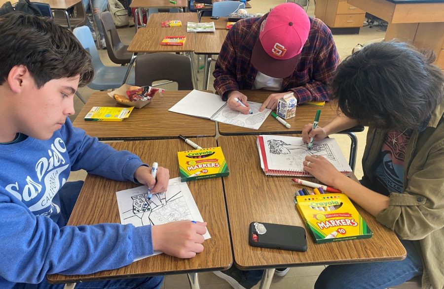 On Feb. 9 at Bonita Vista High (BVH) in room 401 many students express their feelings in Art Therapy Club on Thursdays. BVH Junior Anthony Gomez (left), junior Daniel Donnelley (middle) and president of Art Therapy sophomore (right) Daniel Hernandez use marker to color and relax during their lunch period.