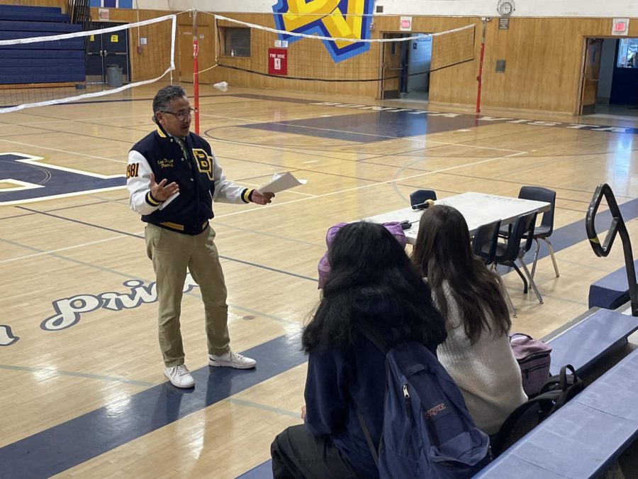 Bonita Vista High (BVH) principal Lee Romero (left) answered questions while seniors Jechaenna Velazco and Isabella Gutierrez (bottom right) listen to what he has to say. Romero held this meeting on January 31, in BVH gym during lunch.