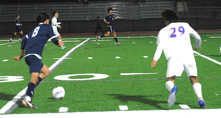 Senior and midfielder Luis Diaz (8), dribbles past Orange Glens defender 29 on a counter-attack. BVH won the game 2-1 to advance in CIF.