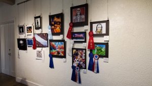 Photography, AP 2D art and design teacher Ed Lim attends every exhibit his students work is displayed in. He shares that there are anywhere from 80 to 100 students at the YAMS.