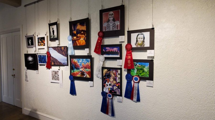 Photography, AP 2D art and design teacher Ed Lim attends every exhibit his students work is displayed in. He shares that there are anywhere from 80 to 100 students at the YAMS.
