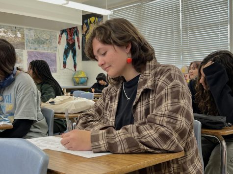 10th grader Danica Fincher, is the only Bonita Vista High student accepted in to the USC summer program. Fincher is Pictured here taking notes on a world history video in class