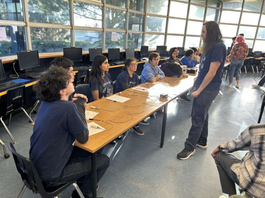 On March 16, there was a quiz bowl competition held at the Bonita Vista High school (BVH) library between BVH and Castlepark. Szakovits can be seen giving a motivational speech for the Varsity quiz bowl team at the halfway point of the competition.