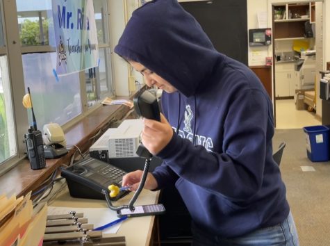 On April 12, in Bonita Vista Highs (BVH) main office, junior and incoming Associated Student Body president Alexis Acosta does the morning announcements. After ringing the xylophone, she led the school in the Pledge of Allegiance.