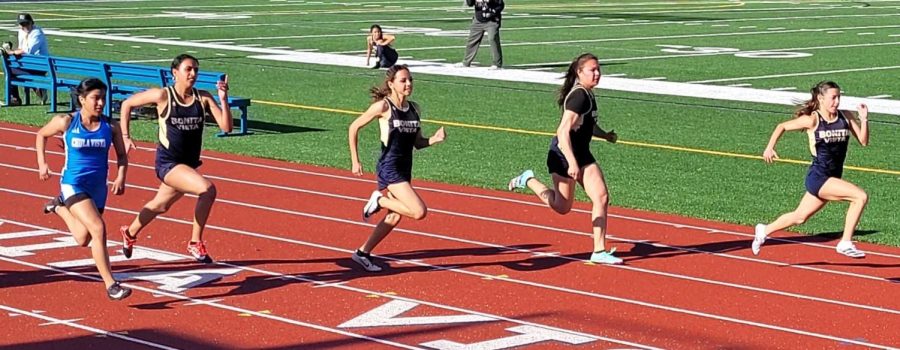 Bonita+Vista+Highs+%28BVH%29+girls+track+and+field+team+competes+against+Chula+Vista+High+%28CVH%29+during+the+girls+100+meter+race+on+Apr.+6.+The+meet+took+place+at+BVHs+stadium.