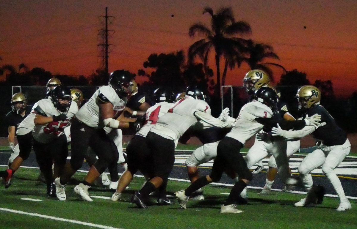 At the Bonita Vista High (BVH) stadium on Aug. 17, the BVH varsity football team holds their first home game of the season against Castle Park High (CPH). As the sun sets, CPH attempts to score a touchdown in the the third quarter while BVHs defense holds the perimeter.