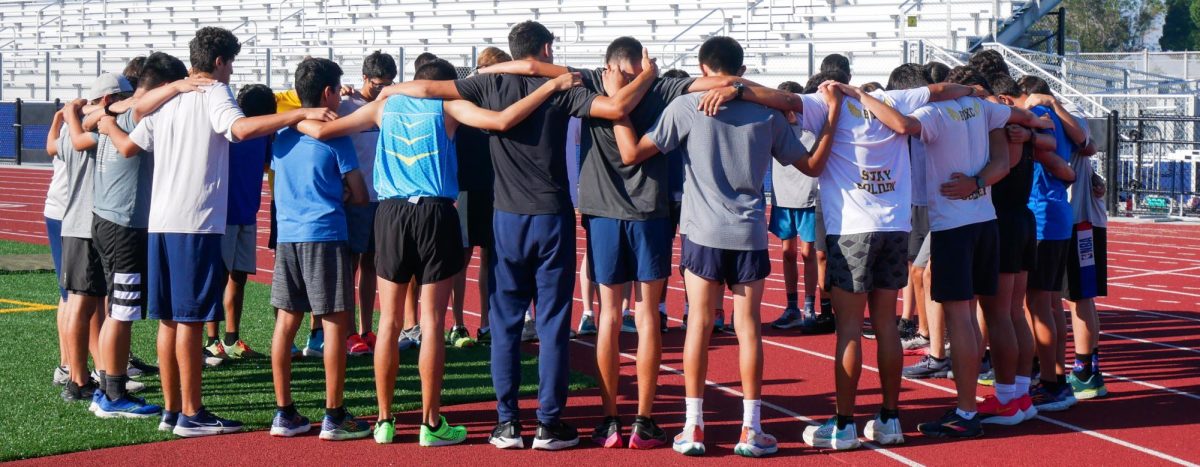 BVH Boys cross country team huddles before their two mile run on Aug. 26 at Bonita Vista High (BVH). They prepare for their upcoming race which takes place on Sept. second at Canyon Crest Academy High.