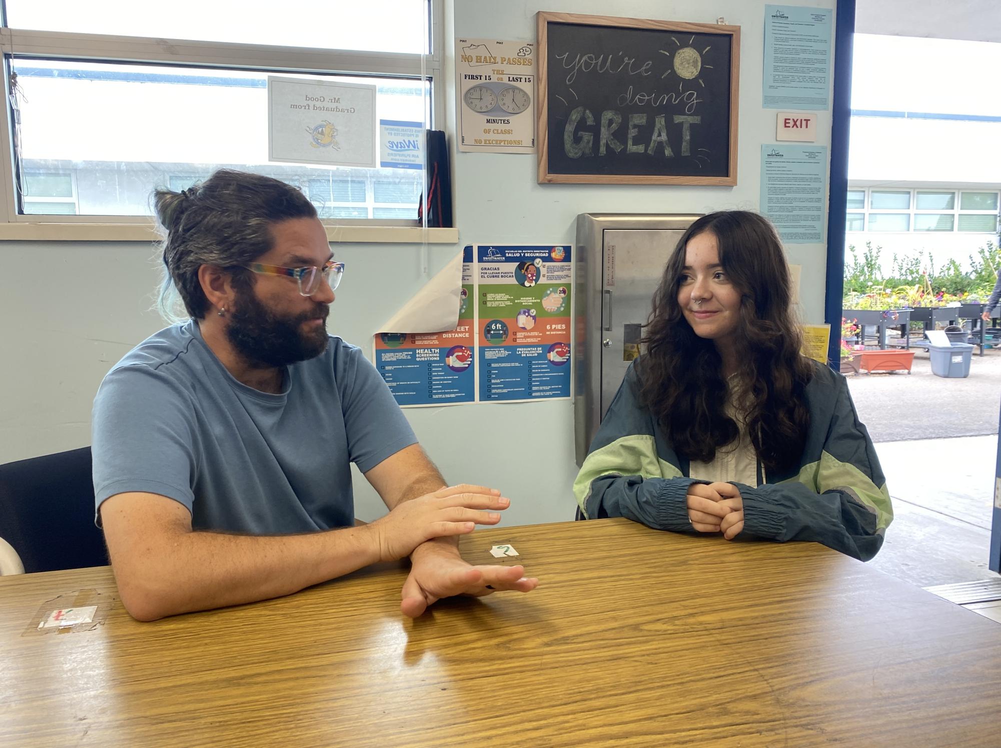 IB Coordinator Jared Phelps discusses the optional PSAT and how it relates to the college admissions process to IB diploma candidate and junior Amy Prince as she plans the next step in her academic future.