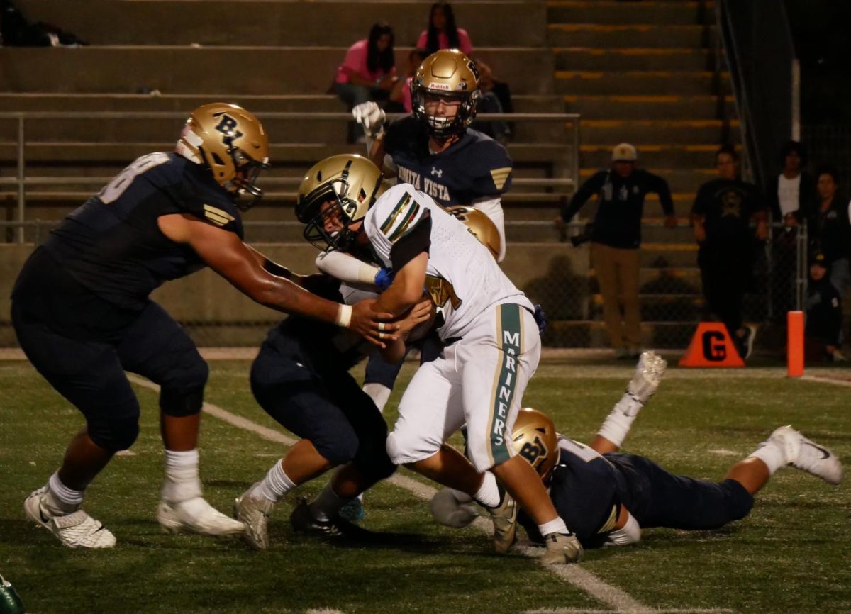 On Sept. 15, the Bonita Vista High (BVH) boys Varsity Football team face off against Mar Vista High (MVH), a team that they lost against last season. Enraged with the results of last seasons game, multiple BVH defenders are shown bringing down an MVH ball carrier.