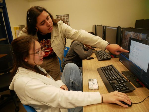Bonita Vista television (BVTV) producer and senior Uriel Lopez assists senior Carolyn Crane during their zero period Career and Technical Education (CTE) Virtual Production Honors program. The class is currently using Unreal Engine—an animating program—to created animated scenes, which is an assignment due on Sept. 22.