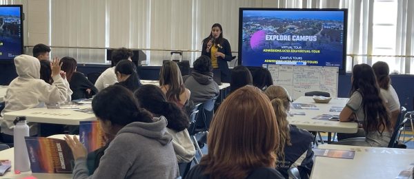 UCSD representative Christina Sandoval-Paquette speaks at Bonita Vista High to inform students of some of the benefits of attending UCSD on Sept. 20. Sandoval-Paquette shows the students her slides about what to expect at UCSD. She also tells them about what programs and clubs are at UCSD.