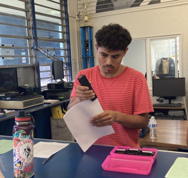 Newly recruited ASB commissioner and senior, Jose Godinez, works the afterschool shift in the ASB office on Oct. 18. Members that have been recently recruited, are starting to fulfill their role in ASB or will begin to.