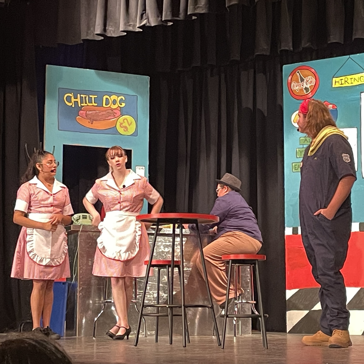 On Oct. 25 2023 Sophomore Lisa Perez, Junior Saphira Mesinger, Alyssa Gonzales, and Sophomore Jeremy Berke act in It All Began on Route 66. The play characters start their act.