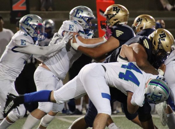 On Oct. 27, the Bonita Vista High (BVH) varsity teams offensive line takes a stand against Eastlake Highs defensive front. Throughout the season, the tough character of the BVH offensive line has been the key to success in the Barons road to the playoffs.
