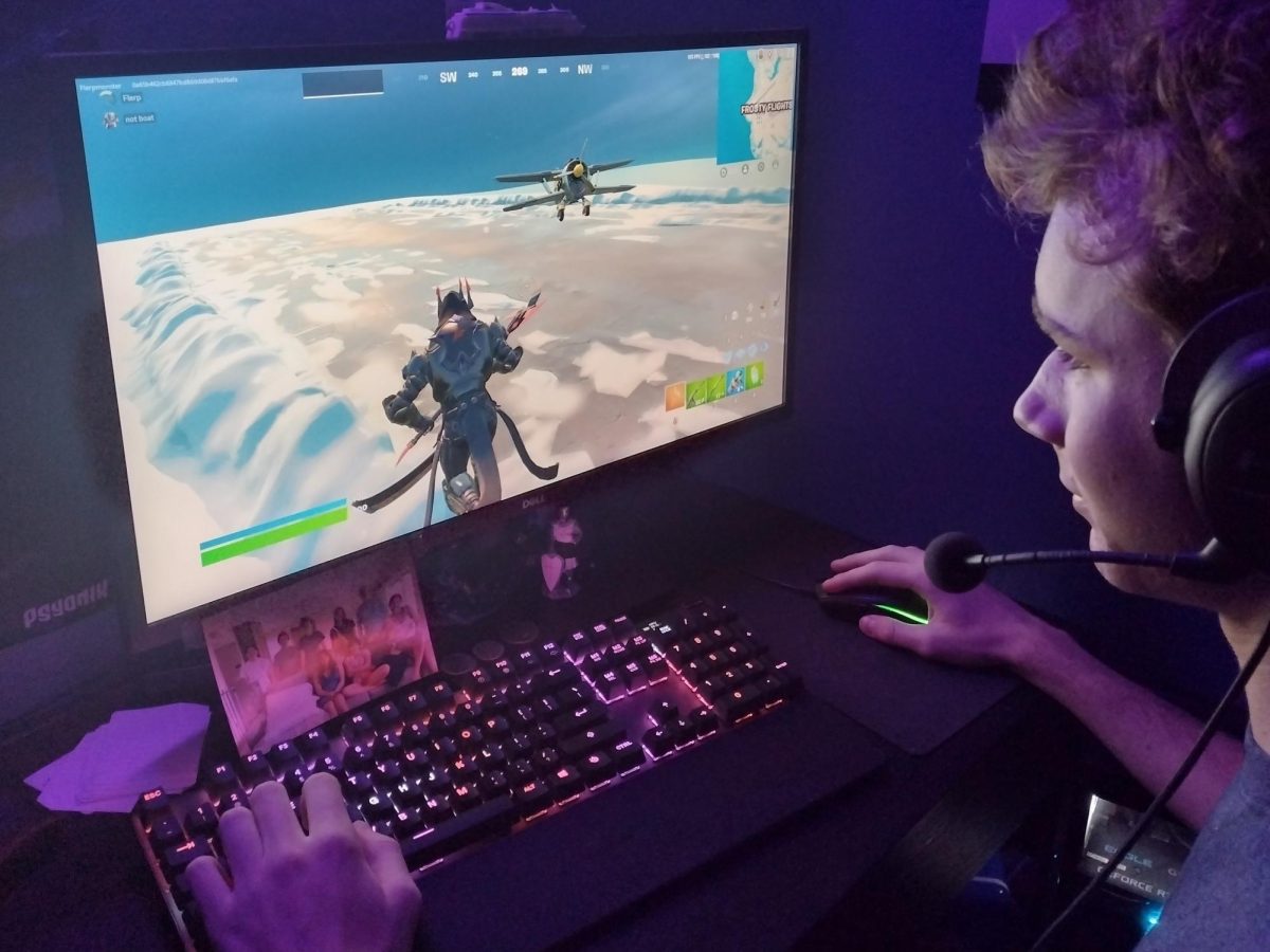 On Nov. 27, senior William Fowler enjoys a game of Fortnite from the comfort of his home. Similar to many others, Fowler has enjoyed Epic Games bringing OG Fortnite back to the game.