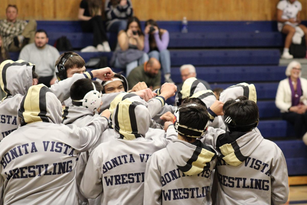 On January 11, the Bonita Vista High (BVH) Barons boys varsity wrestling team faces off against the Hilltop High (HHS) Hulks at a dual meet, with BVH wins against HHS with a score of 57-18. Prior to the first varsity rounds, the team chants Barons! as a way to lift spirits.