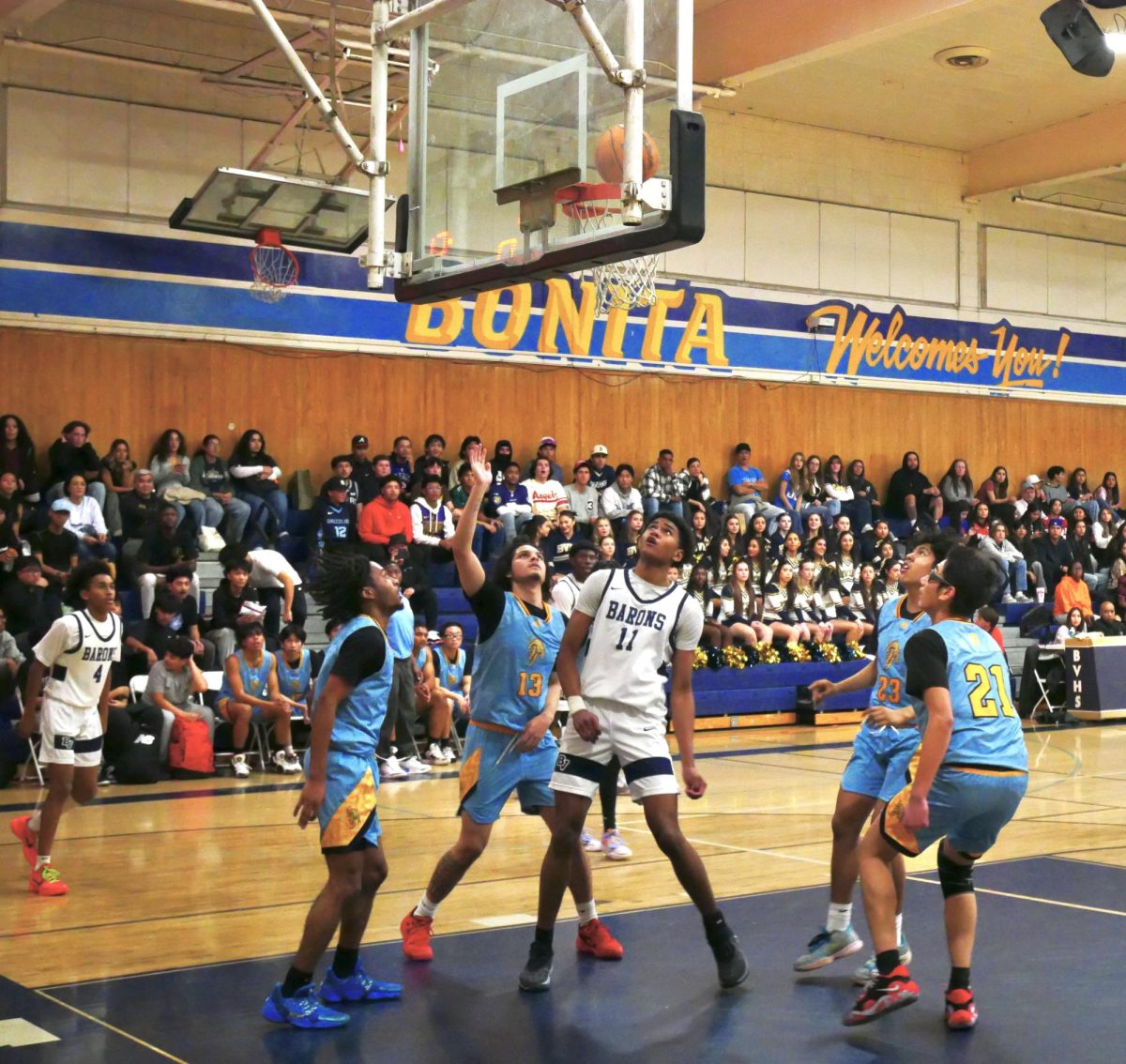 On Jan. 19, the Bonita Vista High (BVH) Barons boys varisty basketball team outplayed their league rivals, the San Ysidro High (SYH) Cougars in a 70-51 victory. Early in the game, BVH small forward and senior Torrean Smalley (11) maneuvers the ball past four defenders and makes a layup that increases the Barons lead over the Cougars.