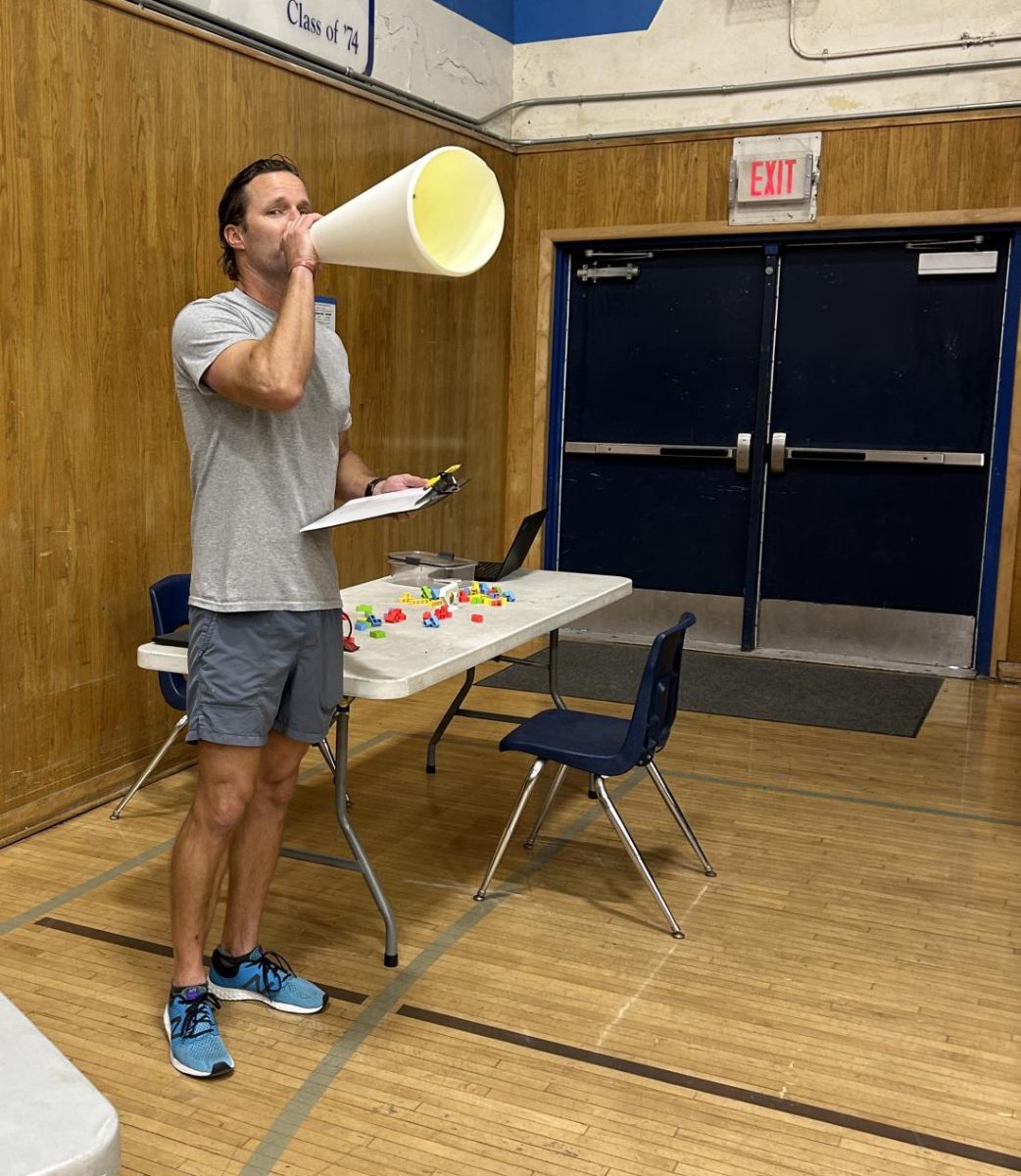 New Bonita VistaHigh (BVH) Physical Education (PE) teacher Daniel Schroeder calls a student to have a discussion during fifth period. As his second official week of teaching he calls his freshman students to learn more about them one on one.