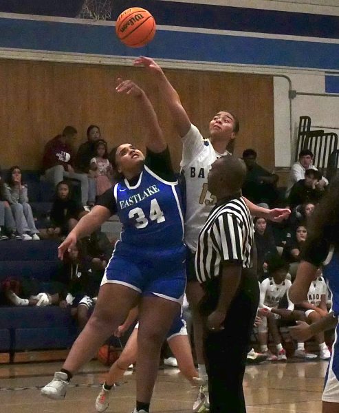 On Jan. 24, 2024, Senior and Small Forward Haydee Arancibia-Hardwick (13) edges out Sophomore Ellie Ruperto (34) during the jump ball in the Lady Barons 77-29 win over the Eastlake Titans.