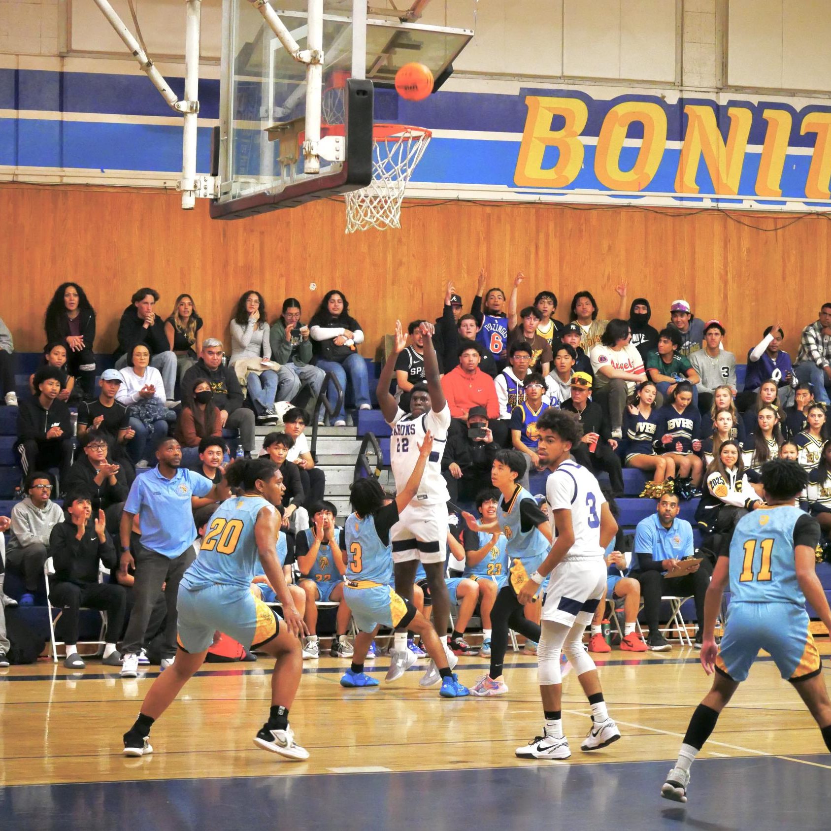 On Jan. 19, the Bonita Vista High (BVH) Barons boys’ varsity basketball team outplayed their league rivals the San Ysidro High (SYH) Cougars in a 70-51 victory. Early in the game, BVH power forward and Junior Aaron Owens (22) shoots a three pointer from far out to tie the score.